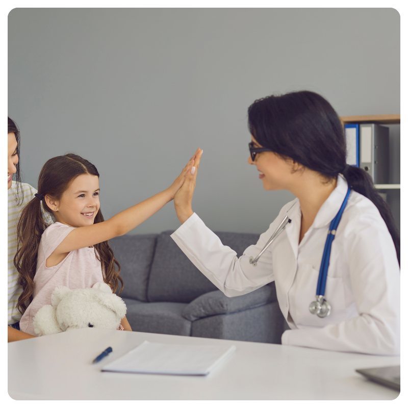 Doctor high fiving a patient
