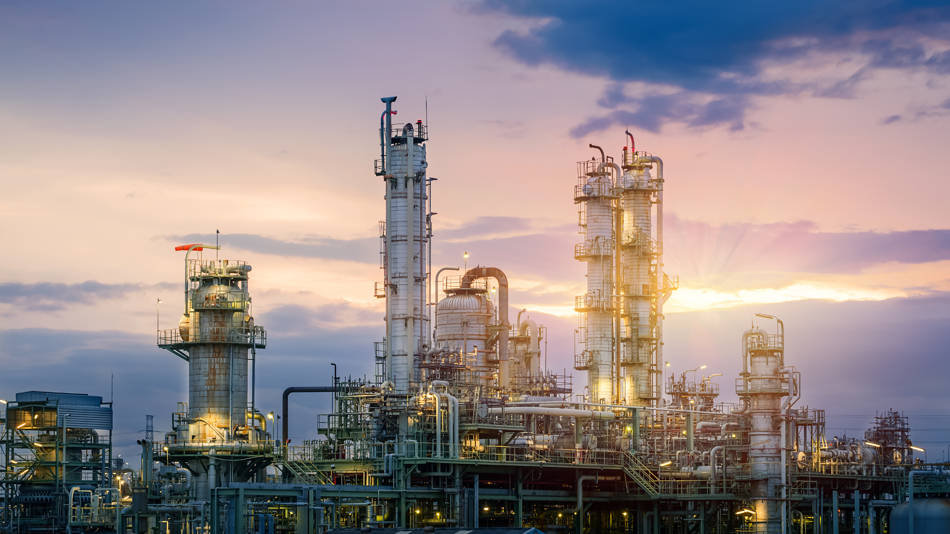 Featured image: Industrial Facility at SunriseWhy OT and IT silos are costing manufacturers more than downtime