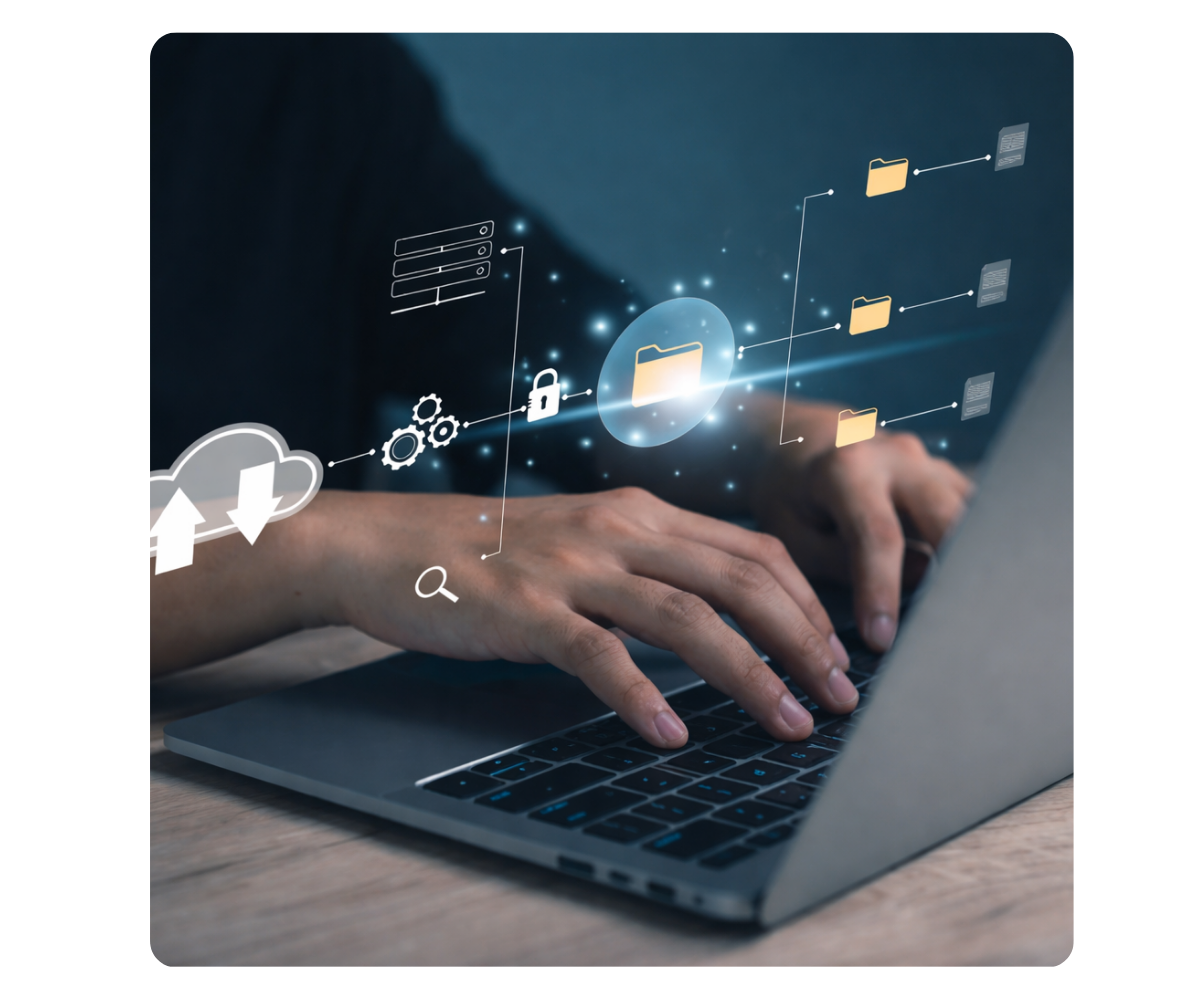 hands typing on a laptop of data folders connecting over the hands
