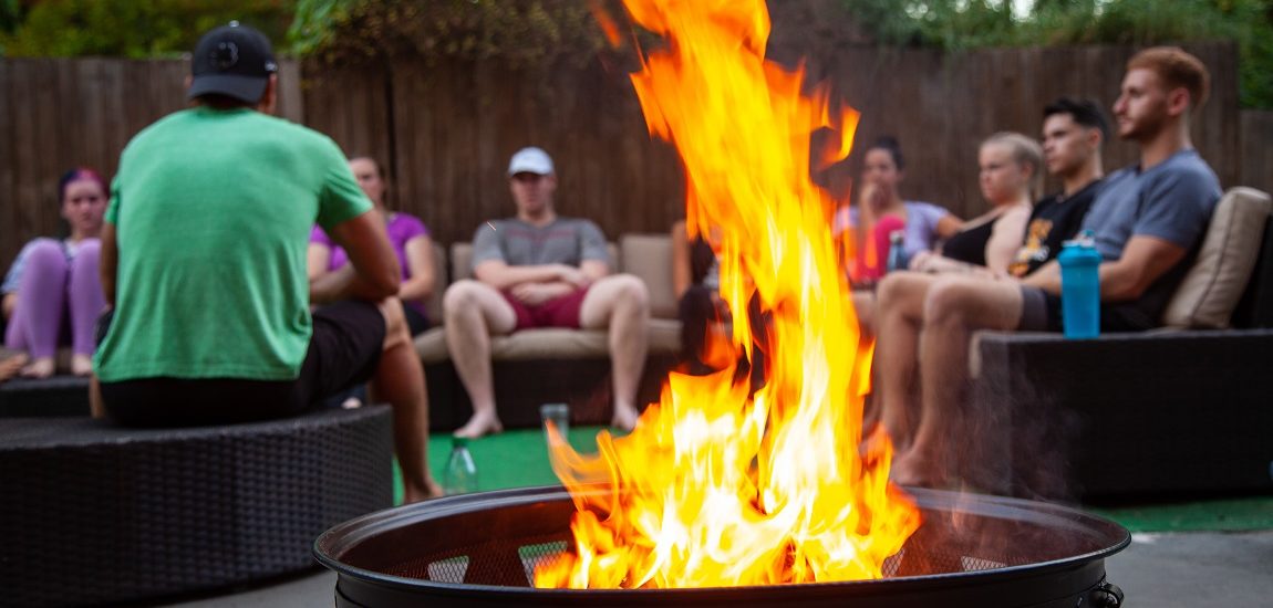 Summer interns learn and bond by the fireside at The Select Group headquarters in Raleigh, NC.